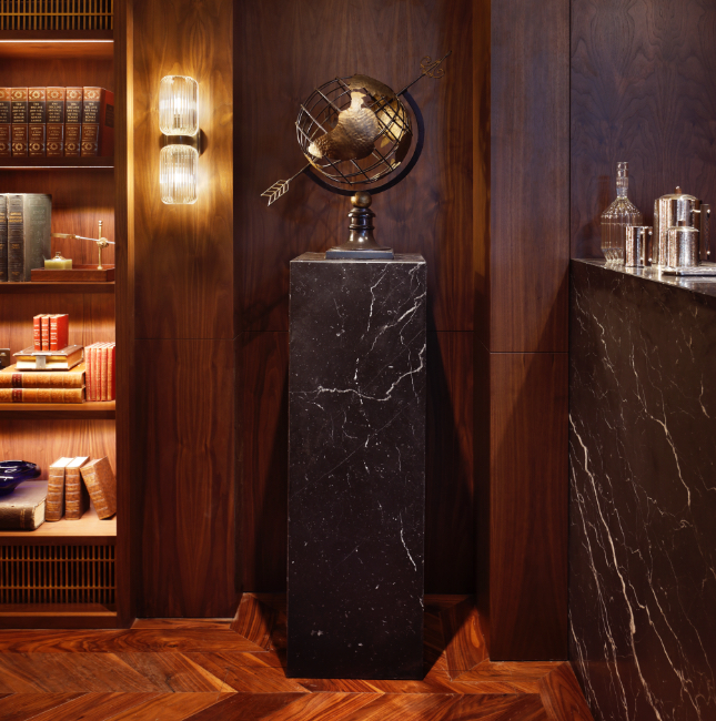 Luxury cigar lounge decoration with marble and wood.
