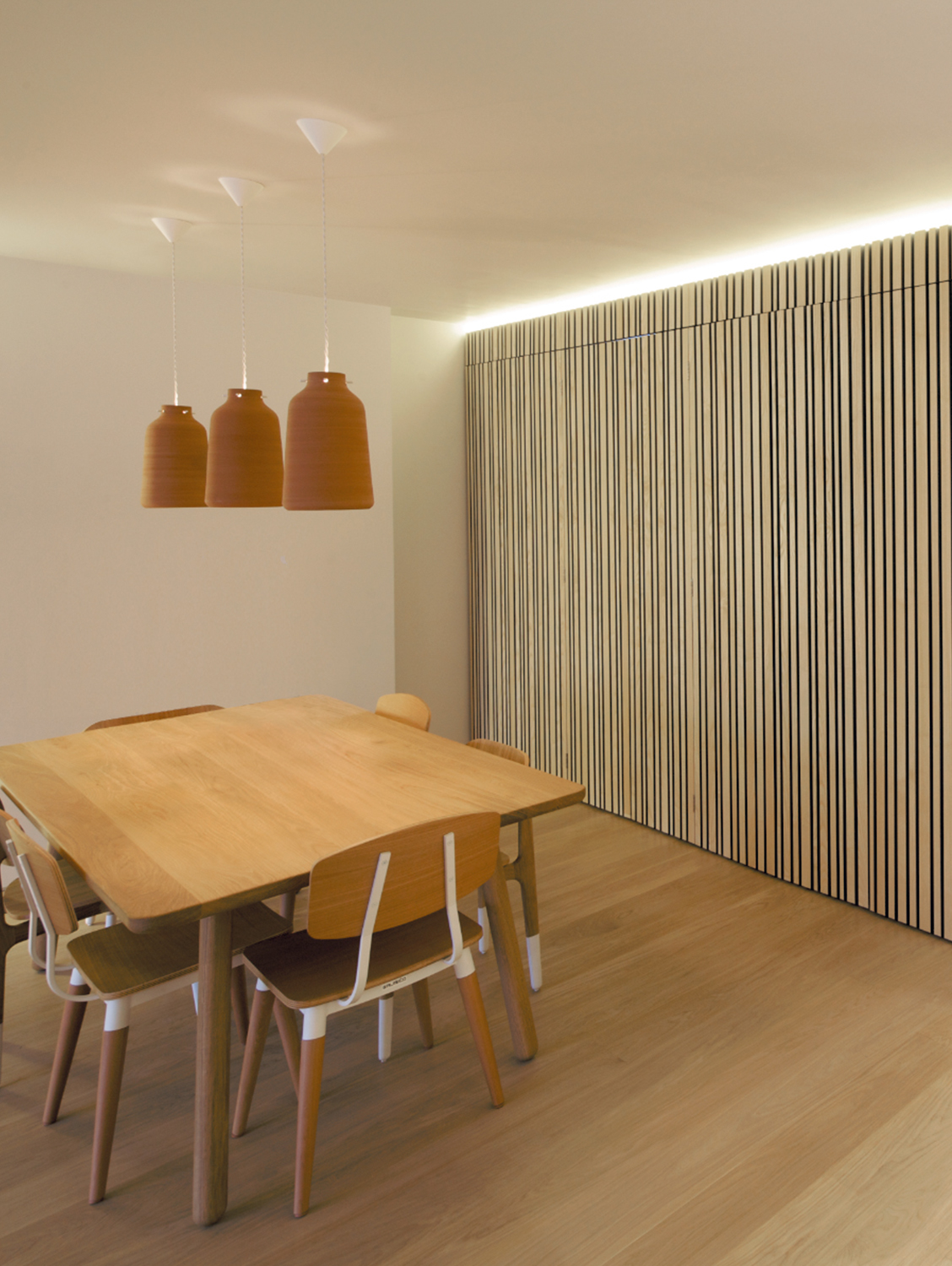 Contemporary open plan kitchen with a dining area.