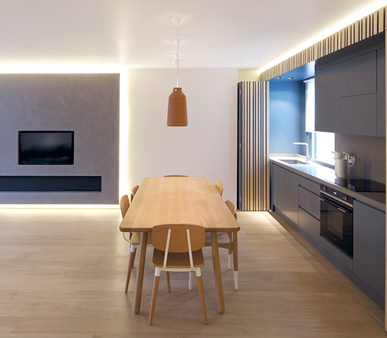 Contemporary open plan kitchen with a dining area.