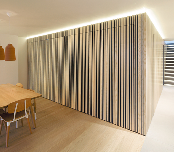 Contemporary dining area with a dining table and chairs.