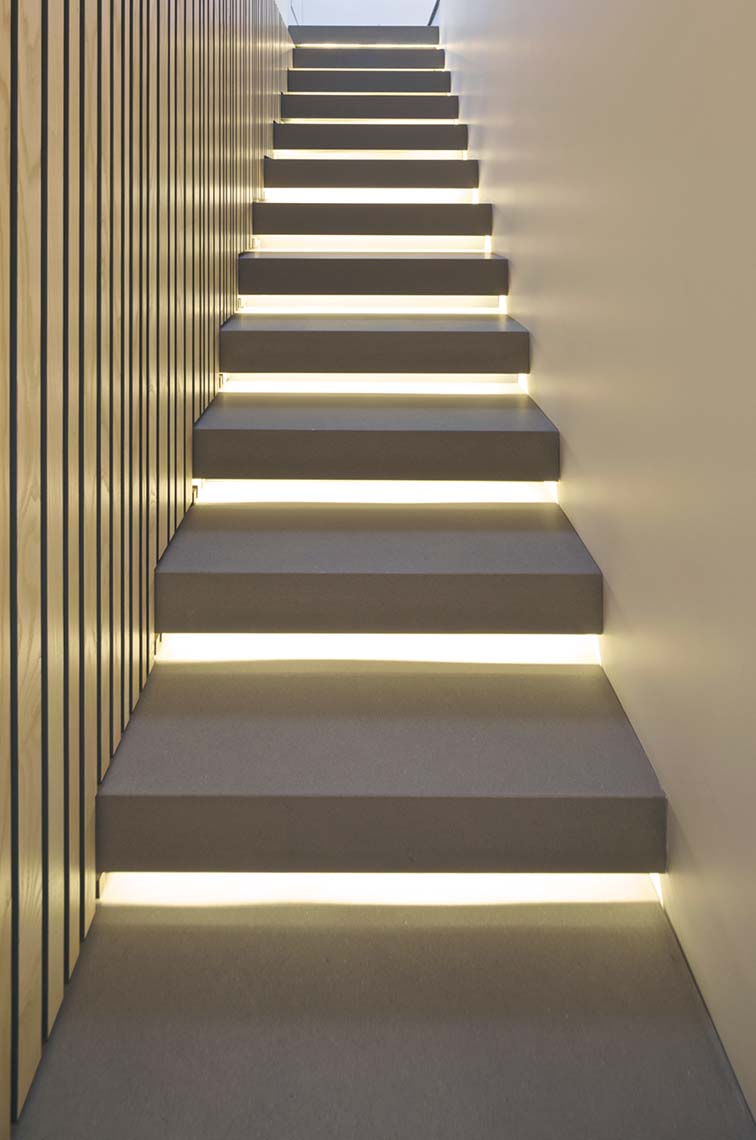Bespoke staircase with illuminated stairs.
