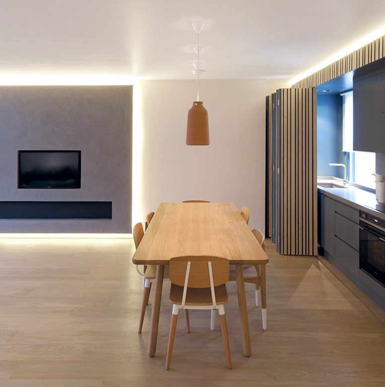 Contemporary open plan kitchen with a dining area.