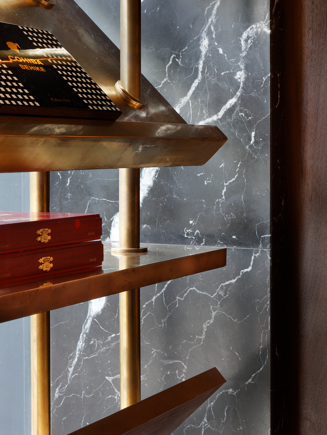 Luxury cigar lounge glass shelf with brass.