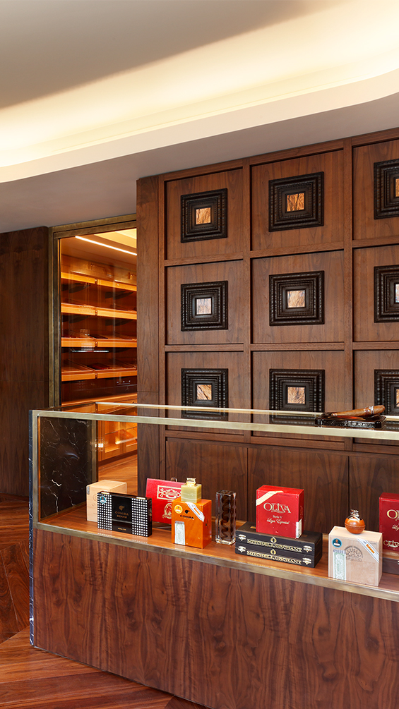 Cigar lounge counter with bespoke timber panelling.